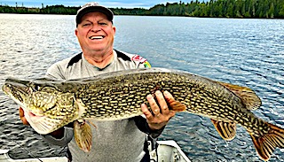 GIANT Trophy Northern Pike Fishing by Butch Ramsey at Fireside Lodge in Canada